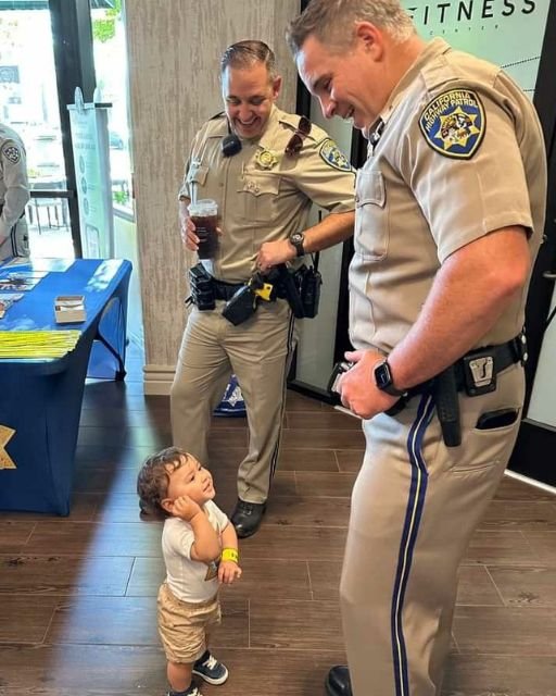 While I was only waiting to withdraw cash from the ATM, my son became best friends with two police officers.